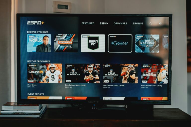 Smart TV interface displaying ESPN+ app for live sports streaming and on-demand athletic events.